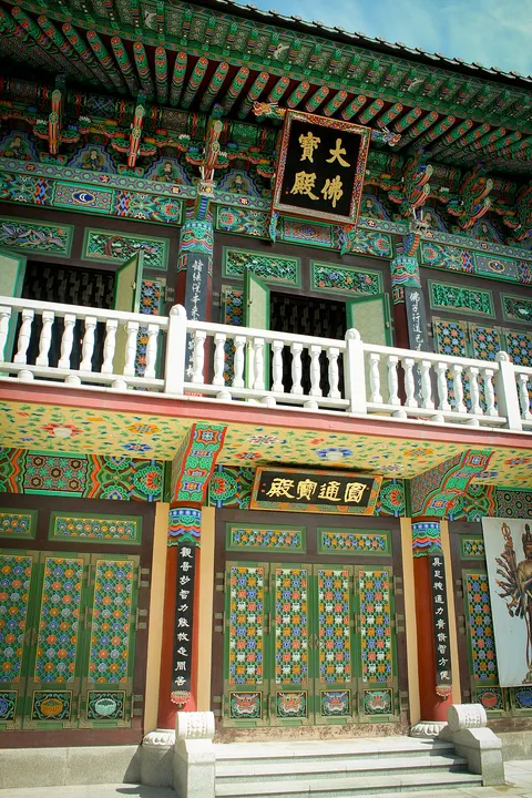 Painted facade and upper balcony of Myogaksa temple